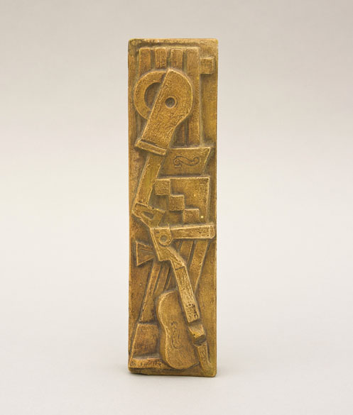 Ladislav Zívr: Hudební zátiší / 1967 / patinovaná sádra / 6 x 23 cm /